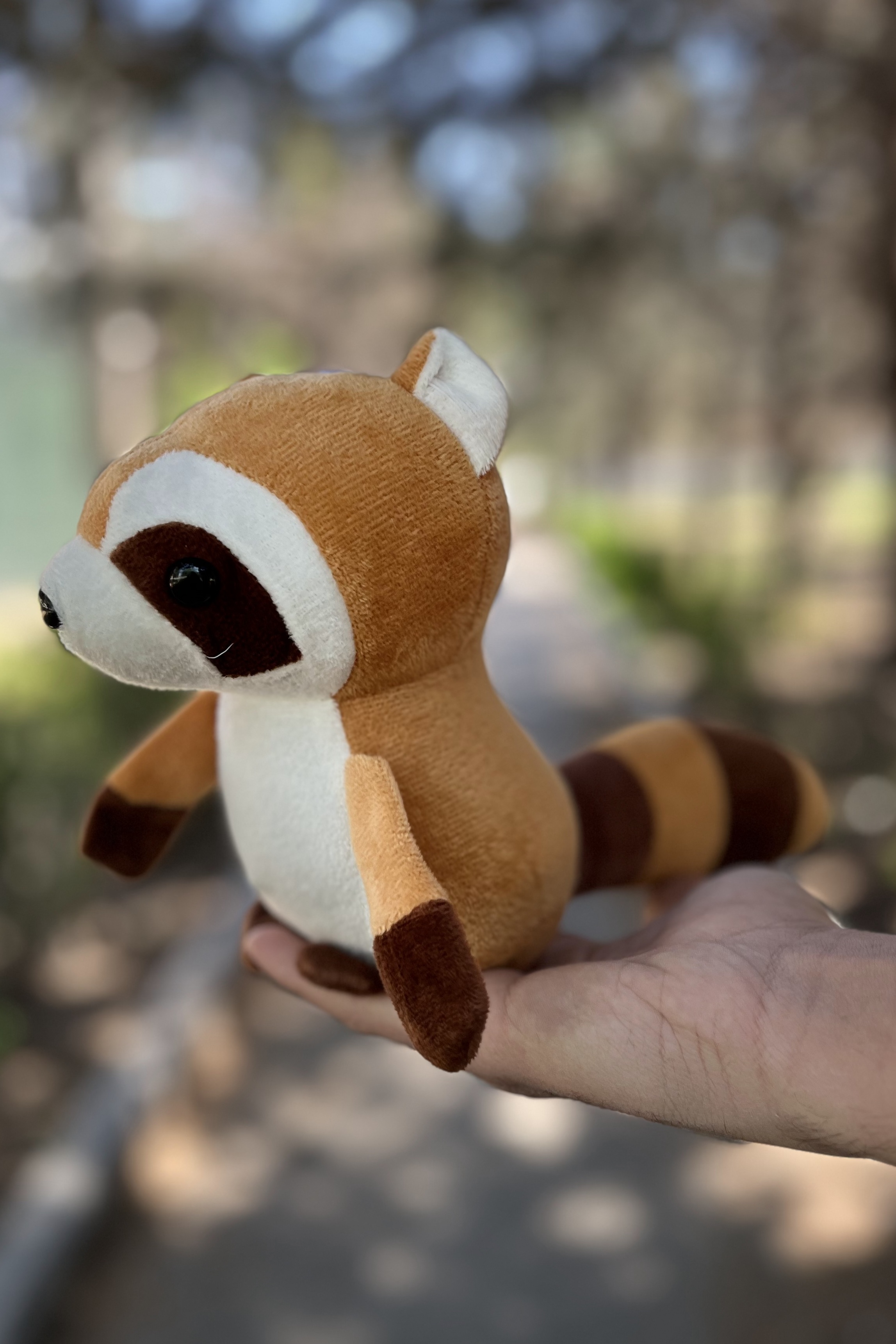 عروسک راکون چشم تیله ای